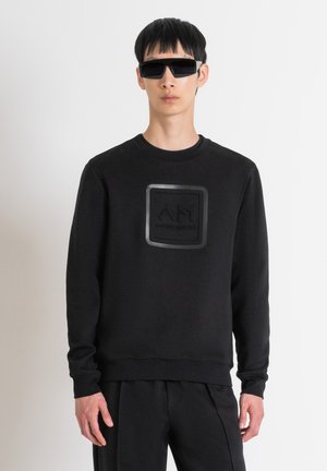 SLIM FIT - Sudadera - black