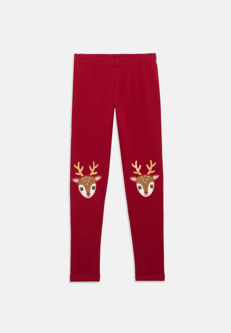Rote Leggings aus weichem Stoff, die auf jedem Knie zwei Aufnäher in Form von Rentiergesichtern mit goldenen Geweihen und verspielten Gesichtszügen zeigen.