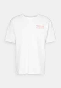 LESS UPSETTI - Basic T-shirt - white