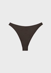 Bas de bikini noir uni taille haute, posé à plat sur un fond blanc.