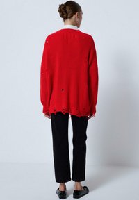 Touché Privé Neule - red