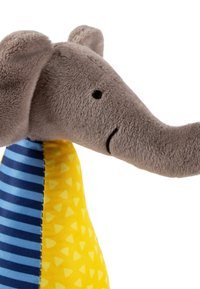 Plush elephant toy with gray fur, a long trunk, floppy ears, and a yellow body featuring triangular patterns and blue striped sections.
