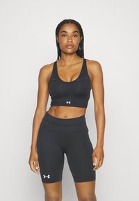 Under Armour SMARTFORM EVO MID - Sportovní podprsenky se střední oporou - black/white