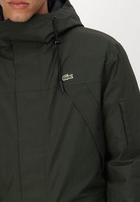 Lacoste Zimní kabát - sapwood