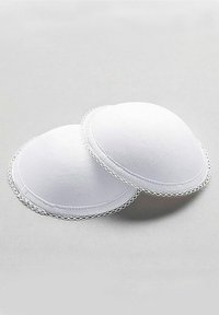 White fabric bra cups featuring a smooth surface, rounded shape, and delicate lace trim along the edges. Suitable for garment inserts.