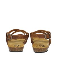 Brown leather sandals with crisscross straps, adjustable buckle, cork footbed, and textured rubber sole. Back view shows flat design.