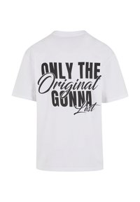 White cotton t-shirt featuring bold black text on the back that reads "ONLY THE Original GONNA Last." Regular fit with short sleeves.