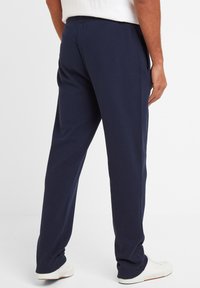 TOG24 BRADLEY - Tracksuit bottoms - dark indigo