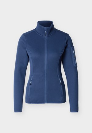 Navy blue textured full-zip jacket with high collar, long sleeves, zippered side pockets, and a zippered pocket on the left upper arm.
