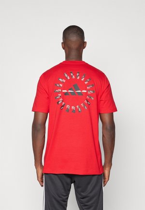 adidas Performance PREDATOR HISTORY GRAPHIC - Potiskana majica - better scarlet