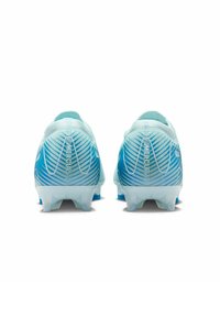 Light blue football boots with a textured upper, gradient design transitioning to darker blue at the heel, and prominent studded traction.