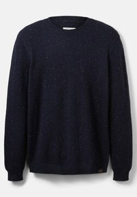 Mörk marinblå prickig ulltröja med rund hals, långa ärmar och ribbade muddar och nederkant.