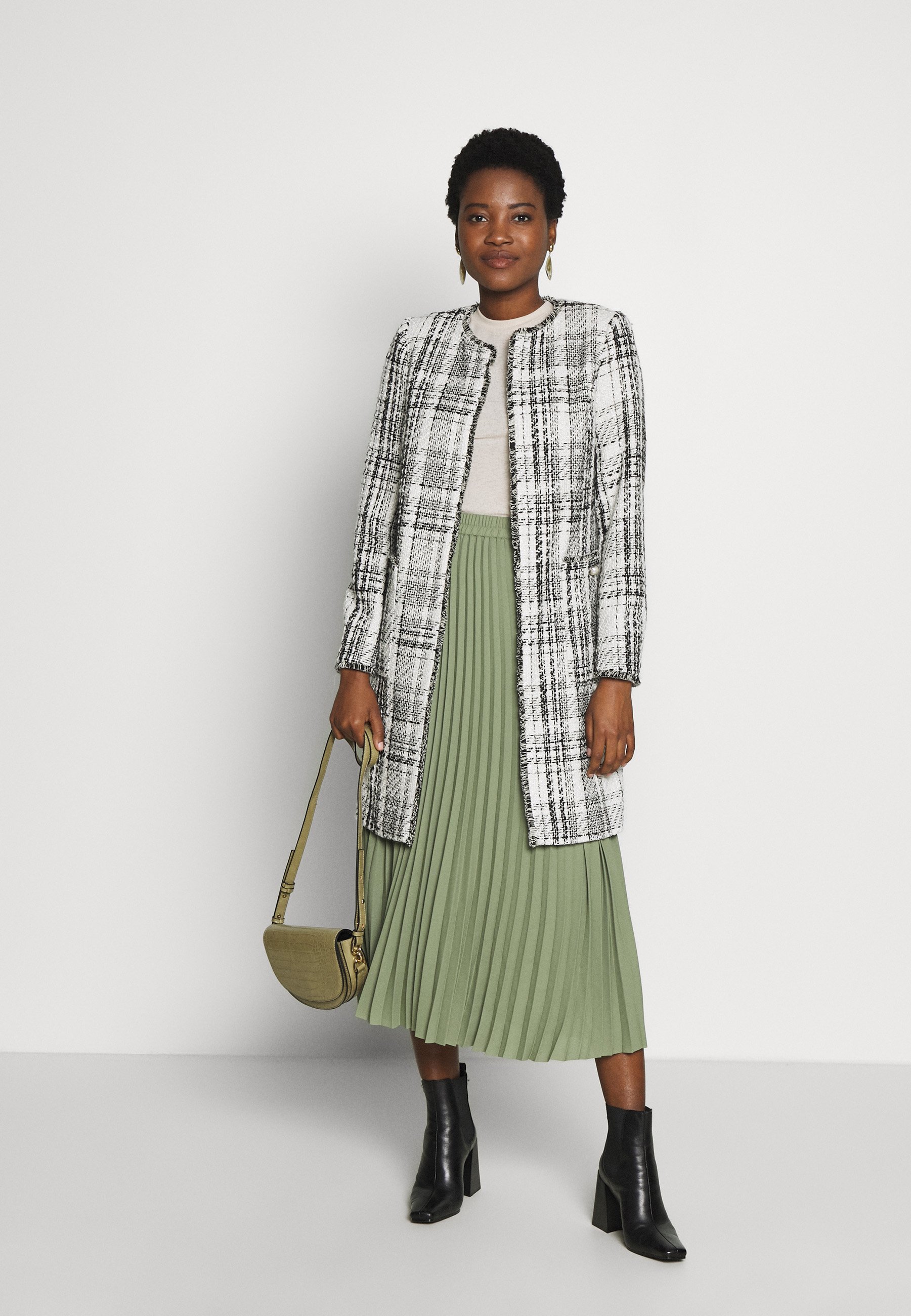 cream collarless jacket