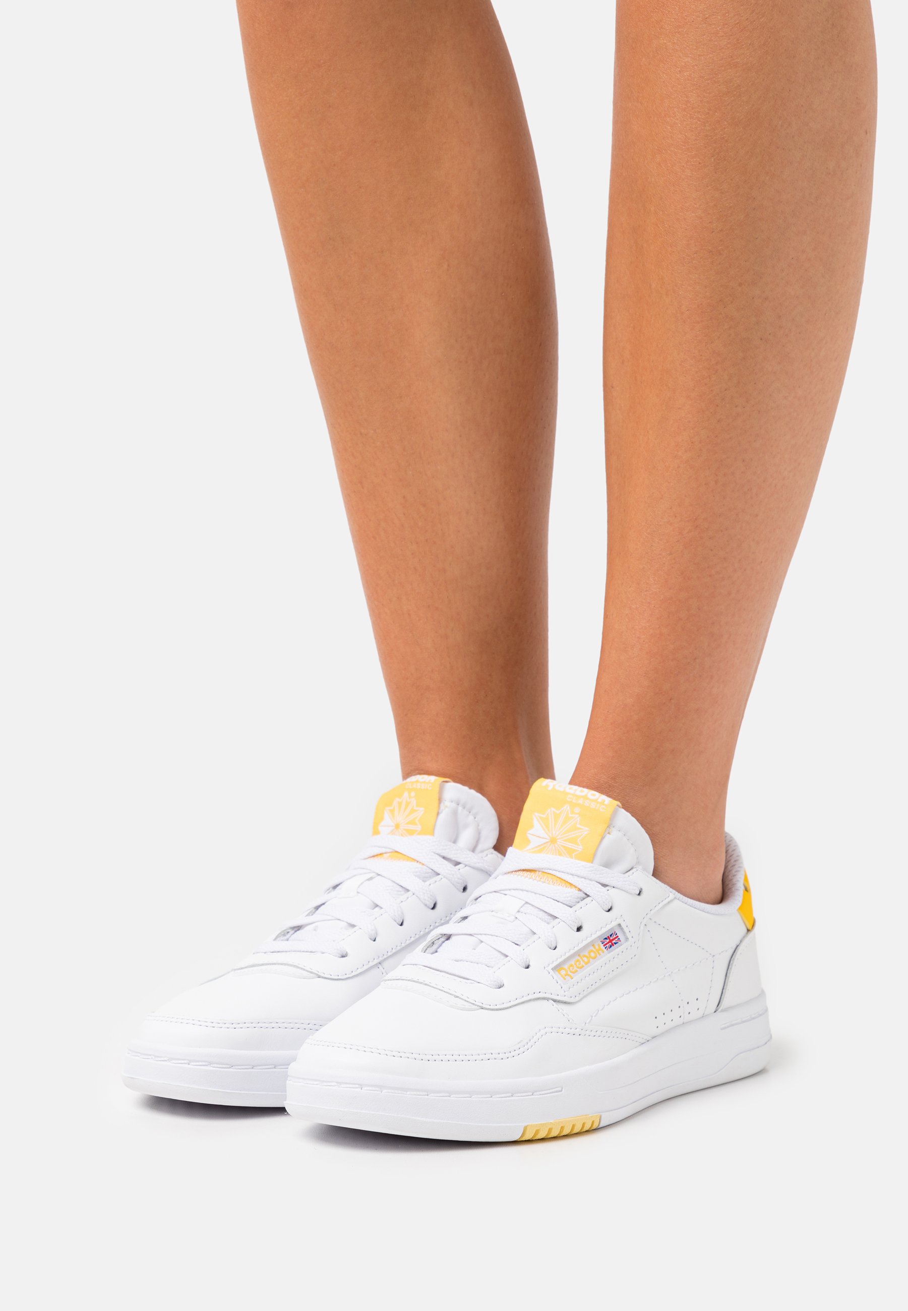 reebok trainers yellow