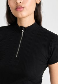 Calvin Klein Jeans VARIEGATED HALF ZIP - Basic póló - black