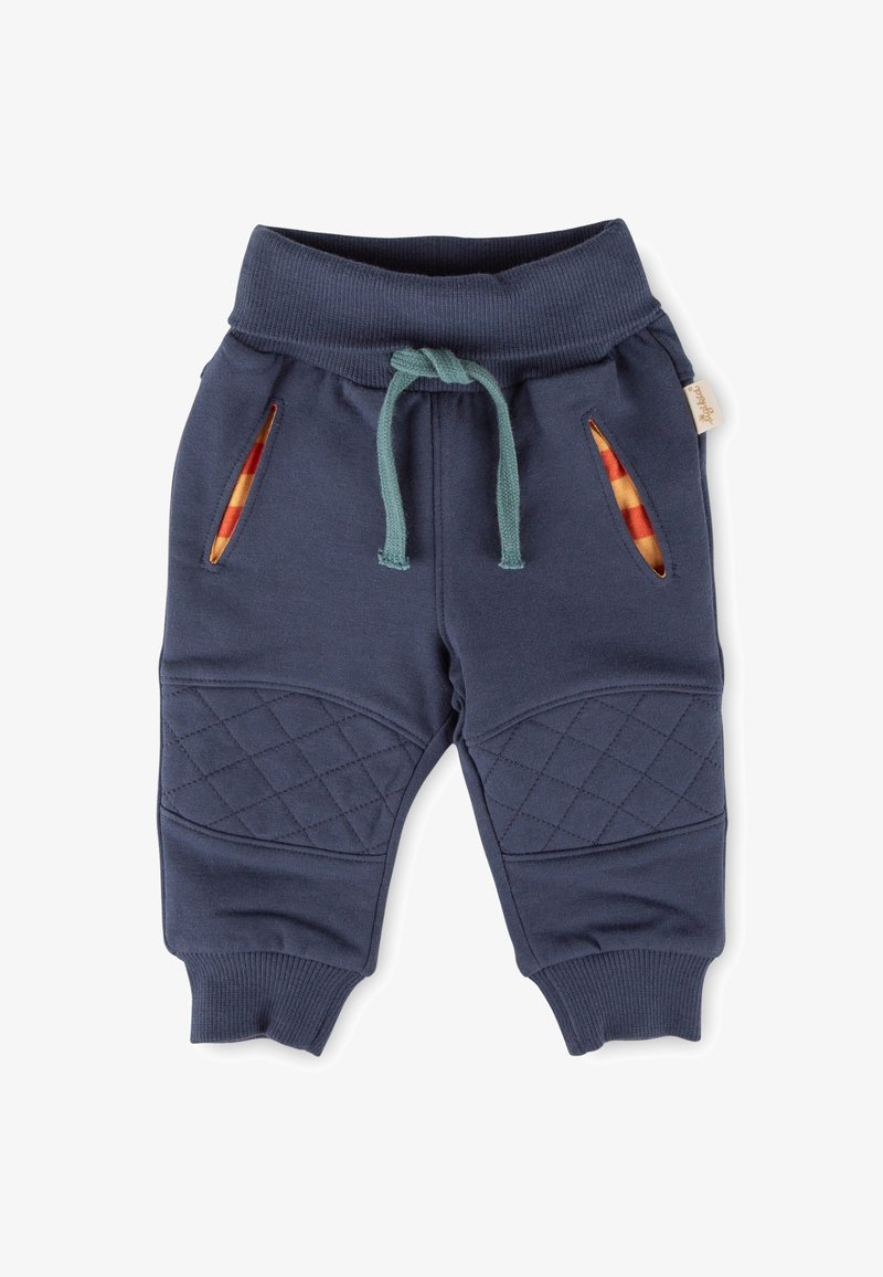 Marineblaue Jogginghosen mit geripptem Bund, dekorativem Kordelzug, gesteppten Knieakzenten und Seitenschlitzen, die karierte Stoffe enthüllen.