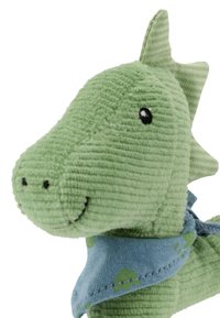 Stuffed dinosaur toy in green corduroy fabric with a smiling expression, featuring a blue scarf with green patterns and textured dorsal spikes.