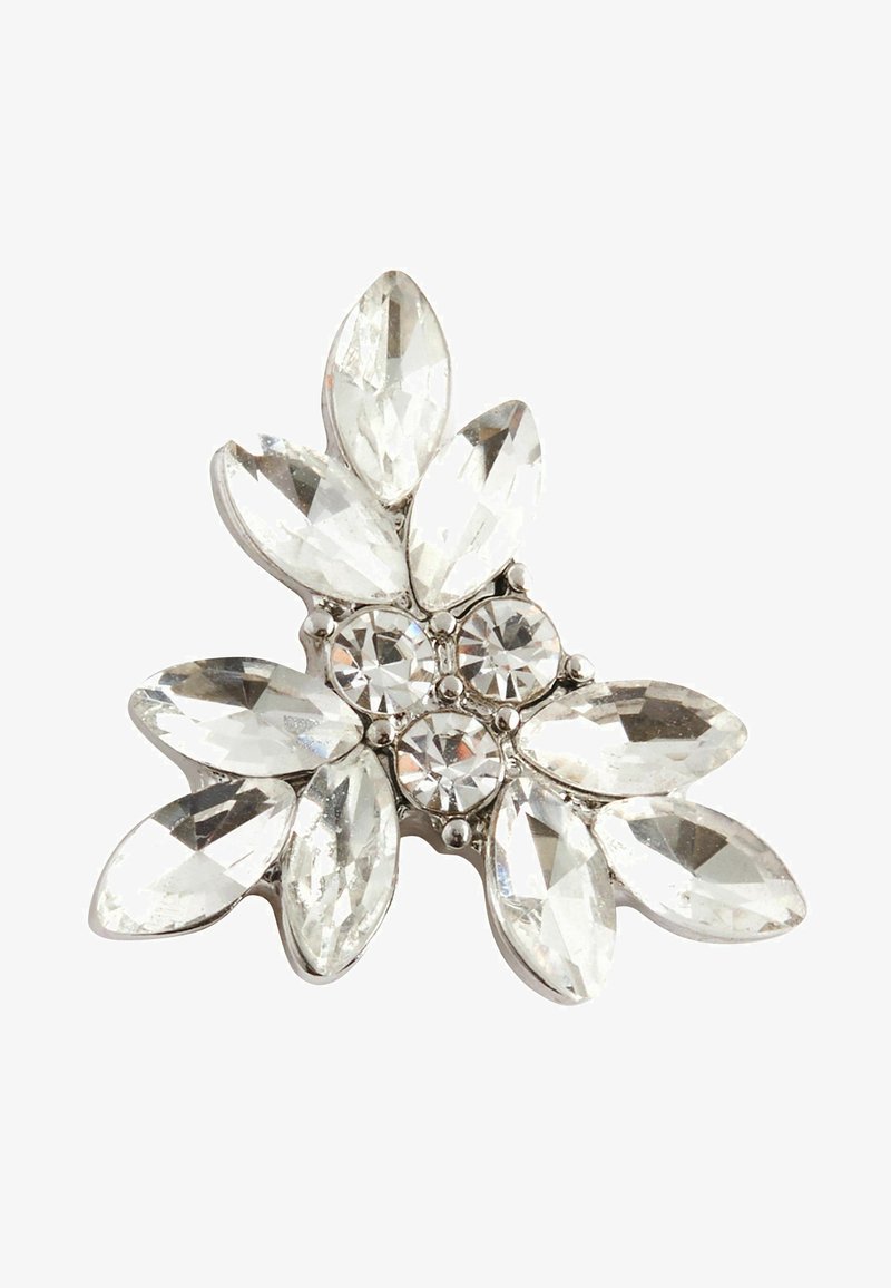 Strasszos bross virágmintával, átlátszó marquise és kerekre vágott kövekkel, ezüstszínű fém alapra szerelve.