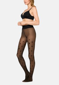 Czarne rajstopy w kropki z przezroczystym wykończeniem, z wysokim stanem i lekkiego, elastycznego materiału zapewniającego komfort i dopasowanie.