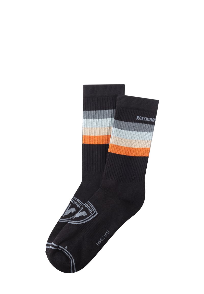 Sorte strømper med ribbet tekstur, der har vandrette striber i lys blå, beige og orange. Inkluderer et gråt logo på siden.