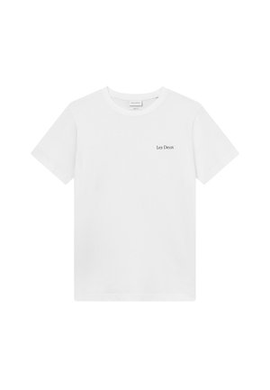 White cotton t-shirt with short sleeves, crew neckline, and a small "Les Deux" logo printed in black on the left chest area.