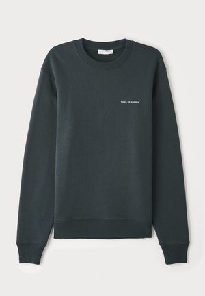 Dark green sweatshirt, crew neckline, long sleeves, ribbed cuffs and hem, featuring a white text logo "TIGER OF SWEDEN" on the chest.