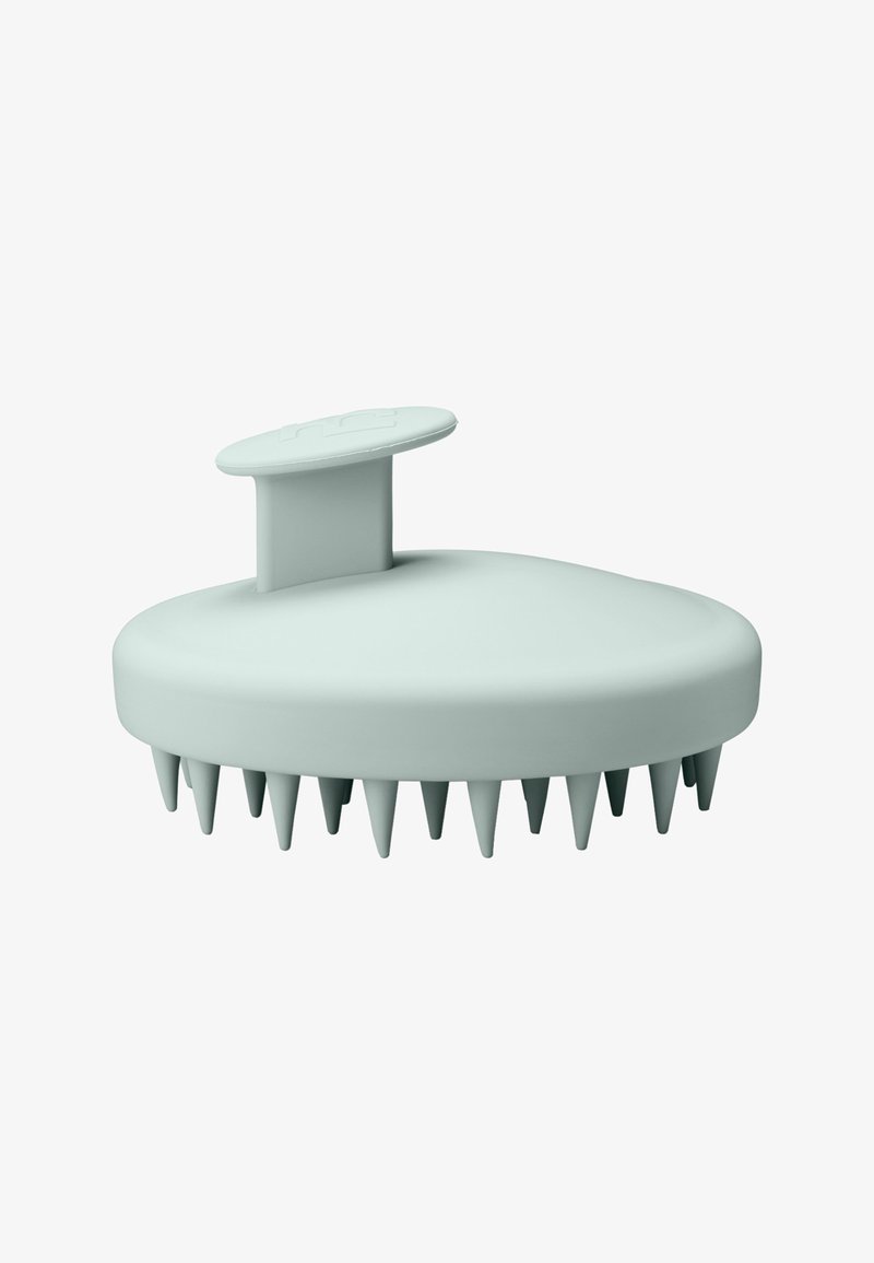 Silikon-Haar-Scalp-Massager, ovale Form, blassgrüne Farbe, mit weichen, abgerundeten Spitzen für sanfte Stimulation und einem Griff für besseren Halt.
