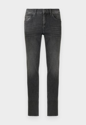 Donkergrijze denim jeans met slim fit, voorzien van vijf zakken, een rits en subtiele vervagingdetails aan de voor- en achterkant.