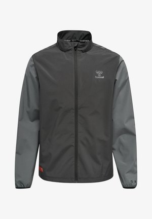 Veste coupe-vent Hummel, avec un corps noir et des manches grises, fabriquée en matériau lisse et léger, dotée d'une fermeture éclair sur le devant et de détails de logo.