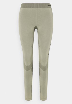 Hochtaillierte, olivgrüne Leggings mit strukturiertem Design und anliegender Silhouette. Verfügt über einen gerippten Bund und gemusterte Akzente an den Seiten.