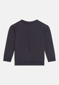 Felpa a maniche lunghe grigio scuro con scollo rotondo, polsini e orlo a coste. Realizzata in un tessuto morbido e testurizzato. Solo vista posteriore.