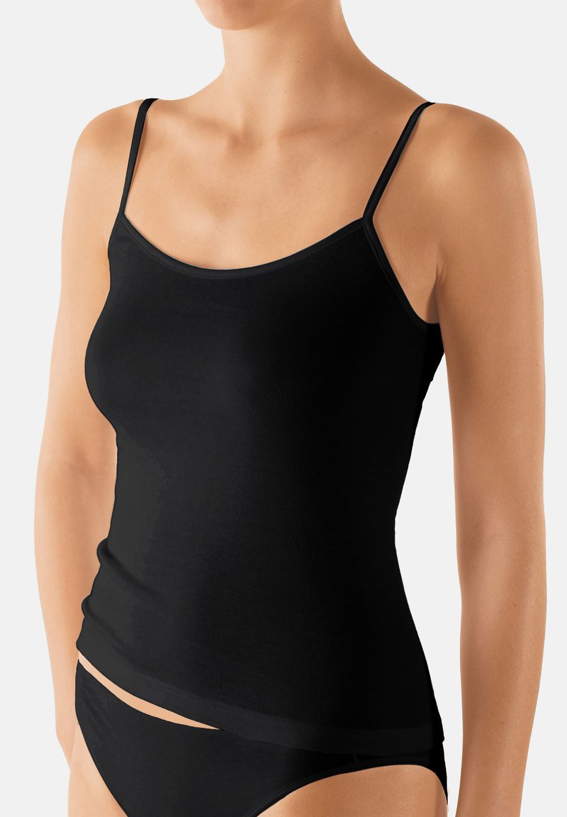 Black camisole with thin straps, featuring a fitted design and smooth texture. Simple, seamless construction suitable for layering.