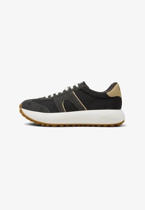 Black mesh sneaker with gray suede accents, white laces, padded collar, and a beige heel. Features a white midsole and rubber outsole.