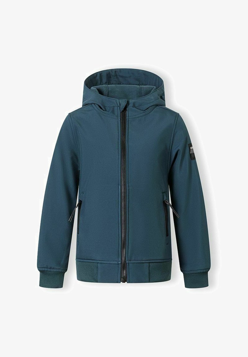 Veste à capuche vert sarcelle foncé avec fermeture éclair frontale, poches latérales zippées, poignets côtelés et écusson sur la partie supérieure de la manche gauche.