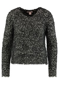 Czarny i biały puszysty sweter z okrągłym dekoltem, długimi rękawami i skróconym krojem. Materiał ma teksturowane, miękkie wykończenie.