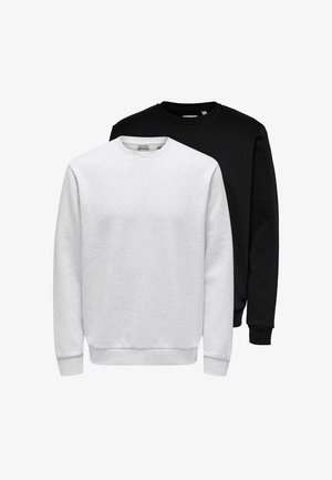 Zwei schlichte Sweatshirts mit Rundhalsausschnitt, eines vorne weiß und eines hinten schwarz, auf weißem Hintergrund präsentiert.