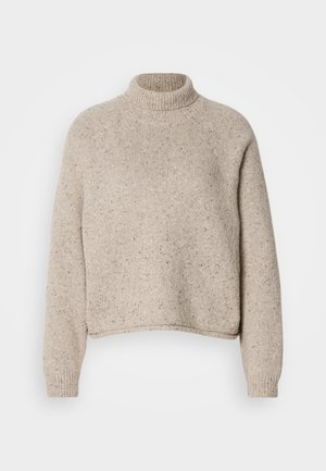 Bež pletena sv sweater z visokim ovratnikom, dolgimi rokavi in skrajšanim dizajnom ter pikčasto teksturo po celotni površini.