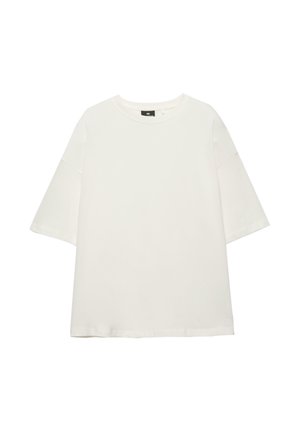Hvid oversized T-shirt med korte ærmer og rund halsudskæring, afslappet pasform og minimalistisk design, lagt fladt på en hvid baggrund.