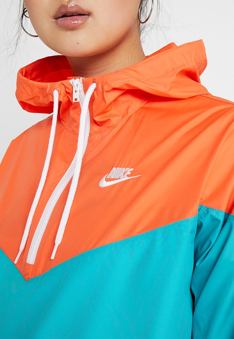 orange and white nike windbreaker