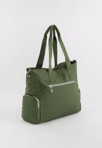 Green nylon tote bag with double handles, featuring a front zip pocket and two side zip compartments. Smooth texture and rectangular shape.