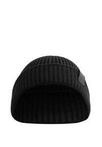 Black knitted beanie with a ribbed texture and a folded brim. Features a small, textured logo patch on the front.
