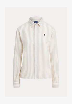 Beežide ja valgete vertikaalsete triipudega pikkade varrukatega nööpidega särk krae ja vasakul rinnal väikese tumeda tikandi logoga.