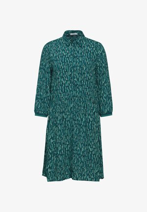 Šaty z tealové látky s límcem, dlouhými rukávy a vzorovaným designem, který obsahuje svislé pruhy v různých odstínech modré a zelené.