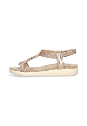 Sandalia de tiras en tono dorado con plantilla suave y acolchada y tirante trasero elástico, mostrada de lado sobre un fondo blanco.