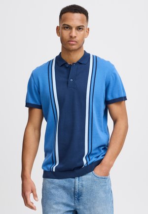 Knitted polo shirt featuring a blue and navy color scheme with vertical stripes and a two-button placket. Short sleeves with ribbed cuffs.