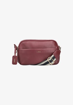 Dark red leather crossbody bag with front pocket, silver zipper, gold logo, and black-and-white adjustable shoulder strap.