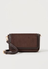 Επιλέχθηκε, dark brown