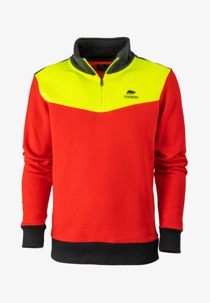 Rote und gelbe Reißverschlussjacke mit hohem Kragen, mit einem schwarzen Saum und Bündchen. Logo auf der oberen linken Brustseite. Weicher Stoff.