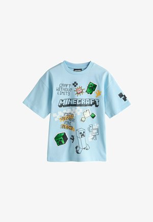 Hellblaues Minecraft-T-Shirt mit pixeligen Charakteren, Blöcken und den Sprüchen "Craft Without Limits" und "Think Outside the Block".