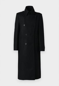 Cappotto doppio petto in lana nera con colletto alto, due tasche laterali e polsini con bottoni, caratterizzato da una vestibilità su misura e da una silhouette dritta.